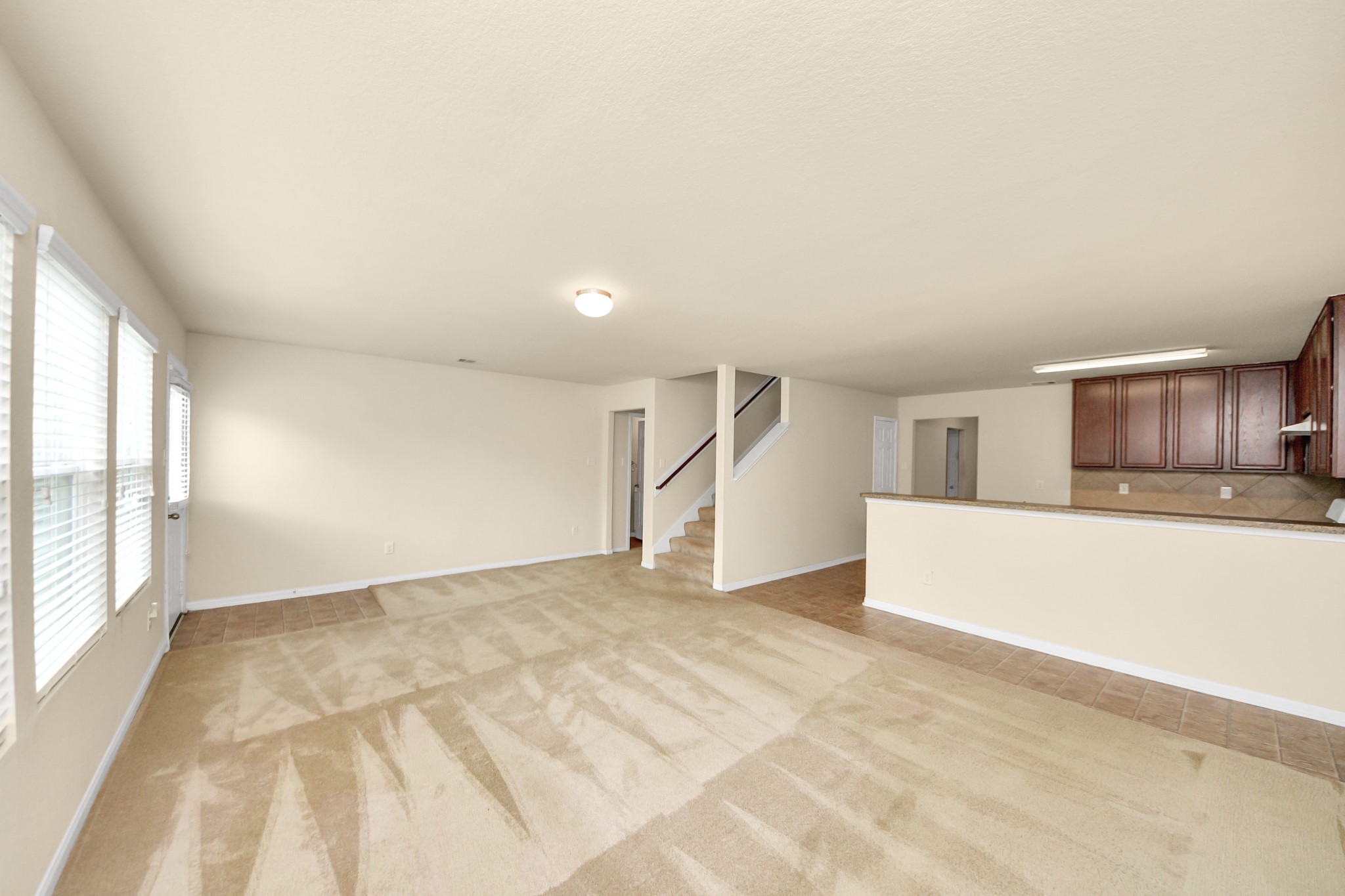 15623 Sheldon Ridge Way Houston, TX 77044 - Photo 8 of 36 a view of an empty room with a window