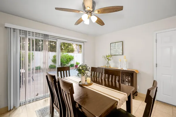 a kitchen with stainless steel appliances a sink and a refrigerator