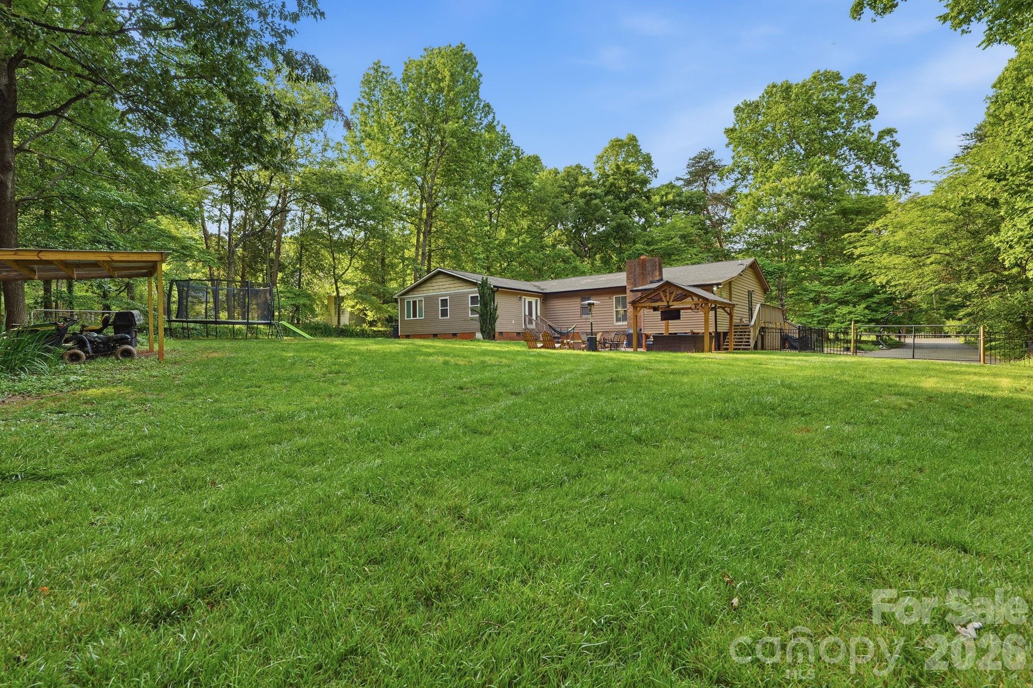 5347 Haney Road York, SC 29745 - Photo 31 of 39 a view of a house with a yard and sitting area