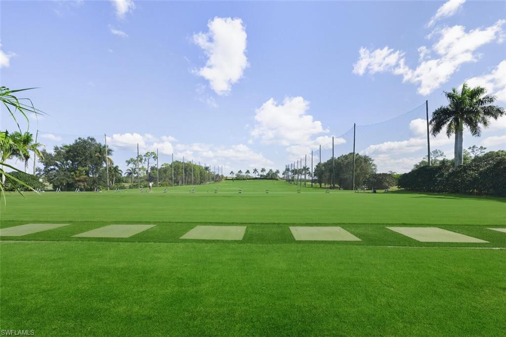 401 Countryside Drive Naples, FL 34104 - Photo 30 of 30 a view of a golf course with a lake