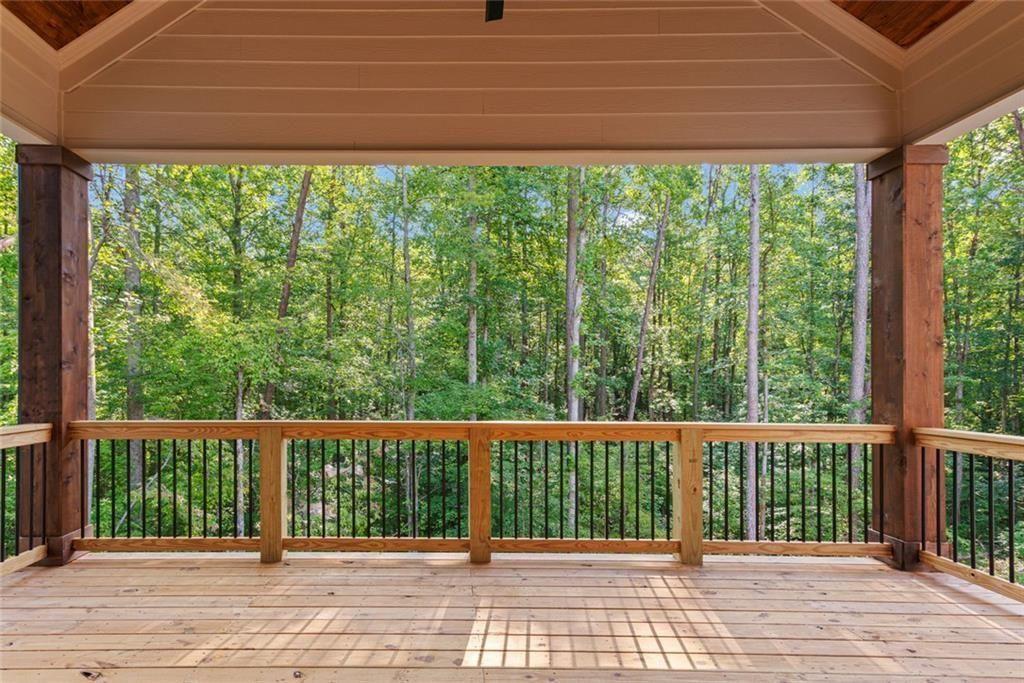 240 Highlands Ball Ground, GA 30107 - Photo 35 of 57 a view of a wooden deck