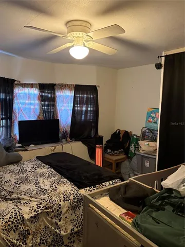 a kitchen with a stove and a refrigerator
