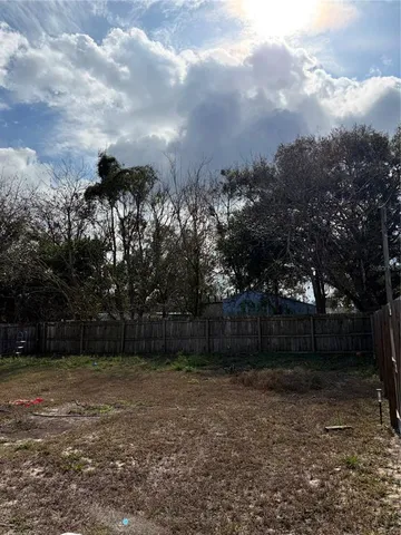 a view of backyard with green space