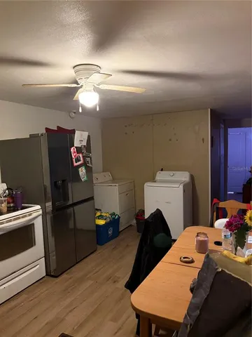 a bed room with a bed and a table