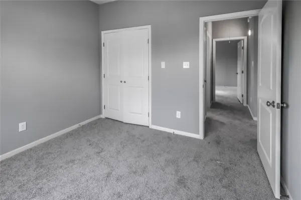 a bathroom with a granite countertop toilet a sink and bathtub