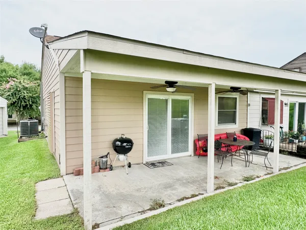 a front view of a house with patio