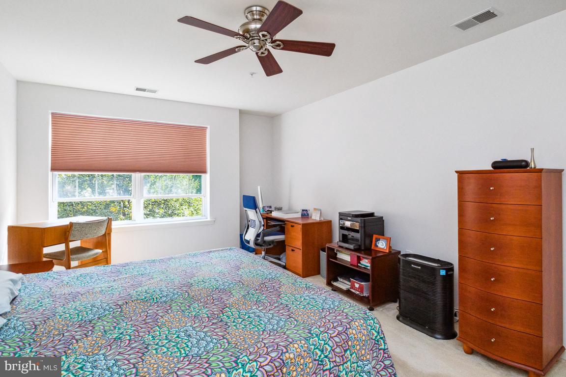 9510 Coyle Road, Unit 409 Owings Mills, MD 21117 - Photo 17 of 24 Primary suite
