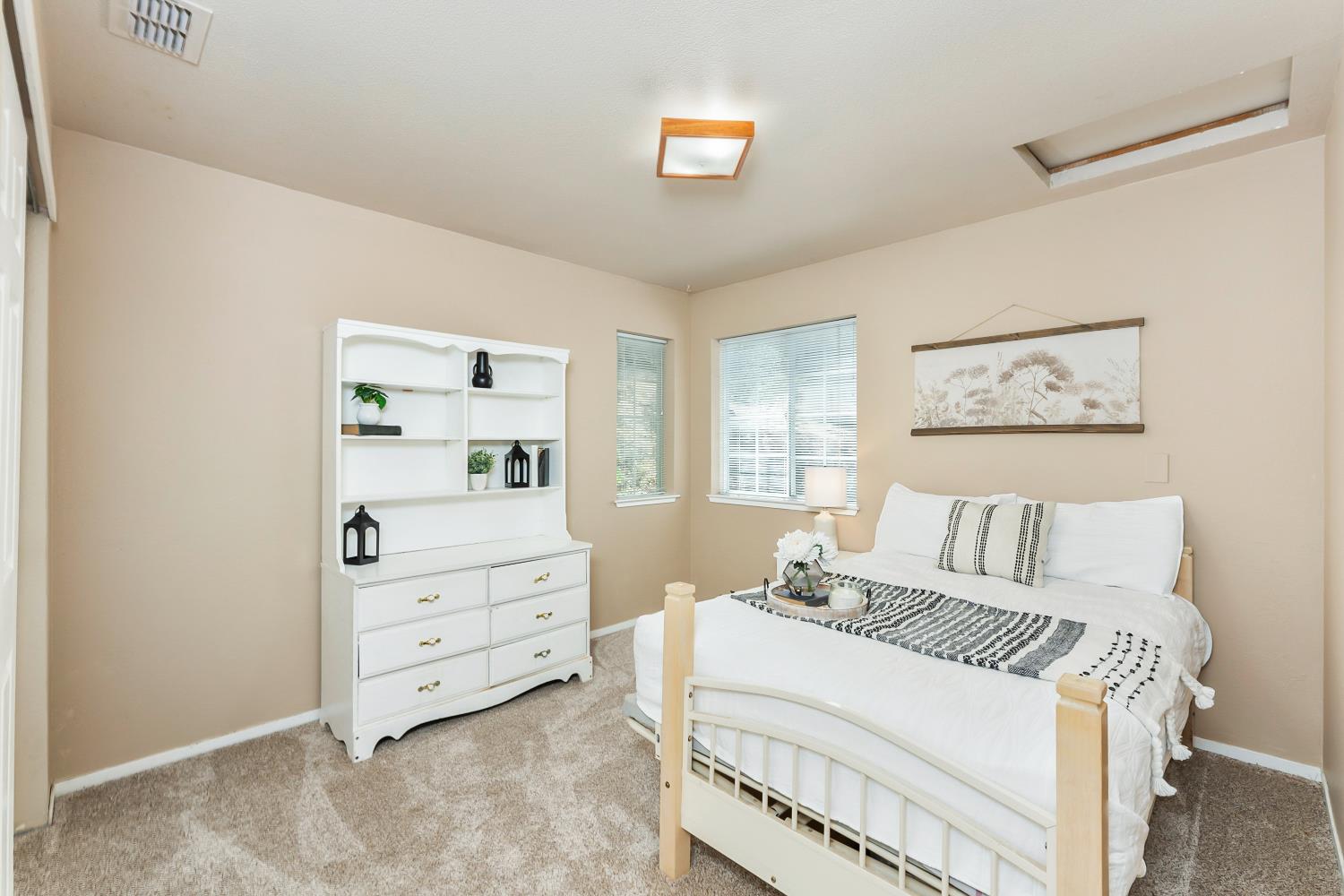 3472 See View Court Rescue, CA 95672 - Photo 26 of 37 a bedroom with a bed and a window