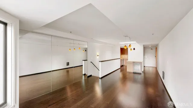 a view of a livingroom with wooden floor