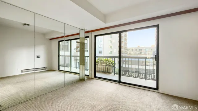 a view of an empty room and window