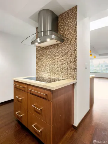 a view of kitchen island with wooden floor