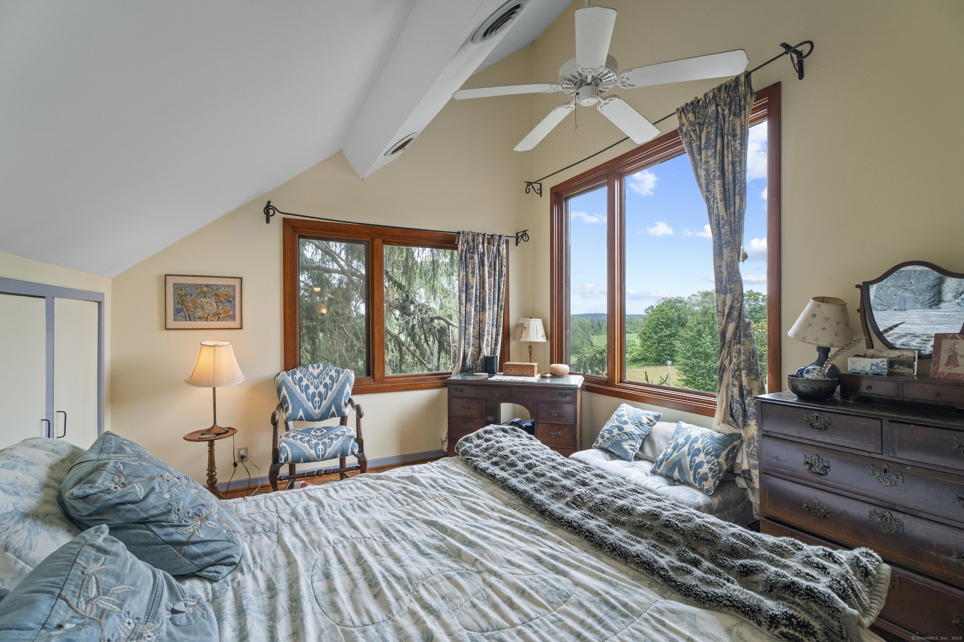 55 A Anna Farm Road West North Stonington, CT 06359 - Photo 24 of 41 a bedroom with a bed and wooden floor