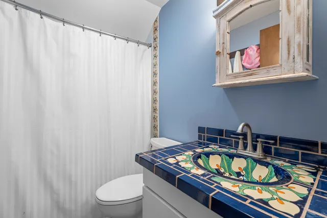 a bed room with a bed and a window