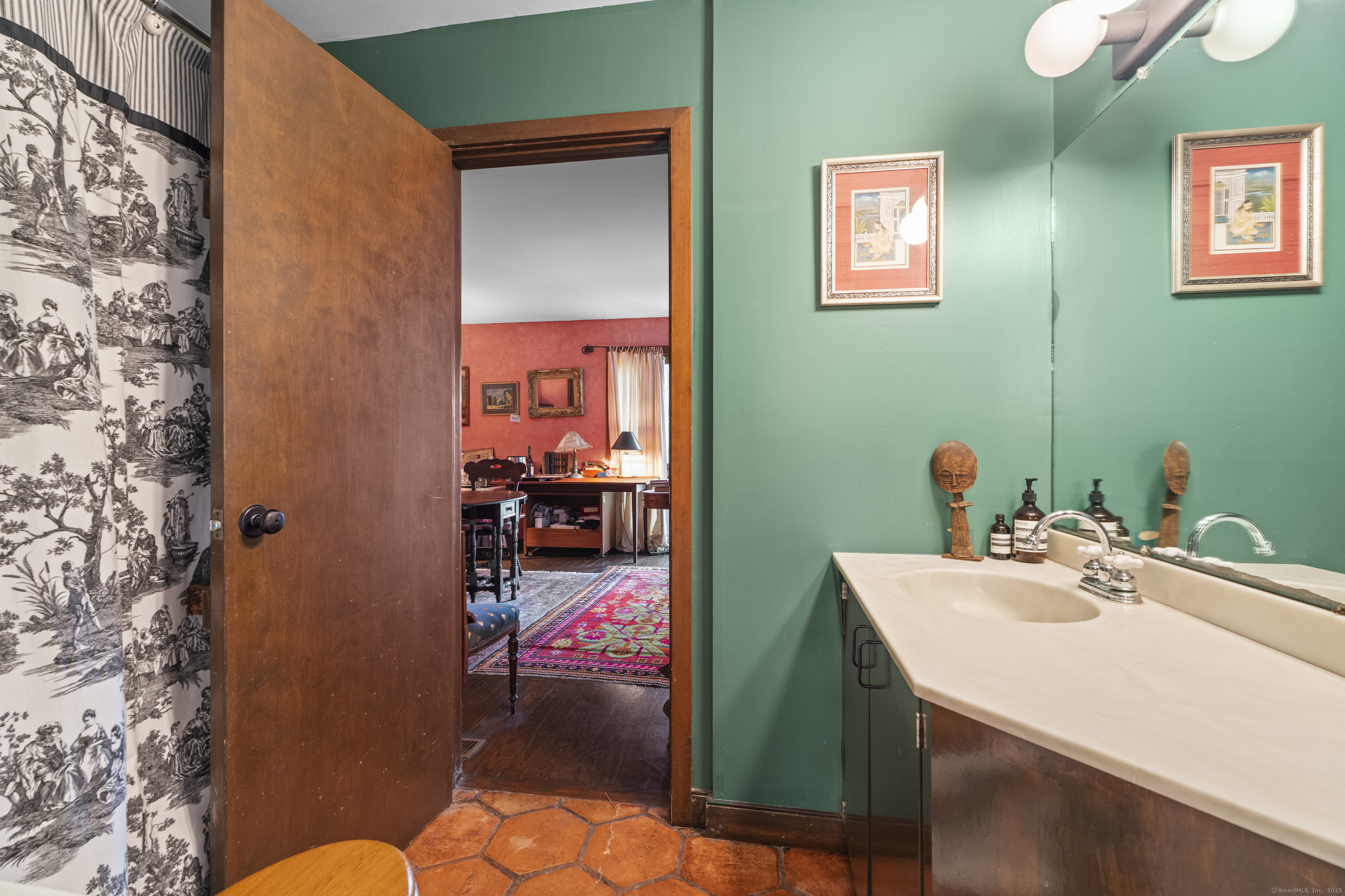 55 A Anna Farm Road West North Stonington, CT 06359 - Photo 29 of 41 a bathroom with a sink mirror and toilet