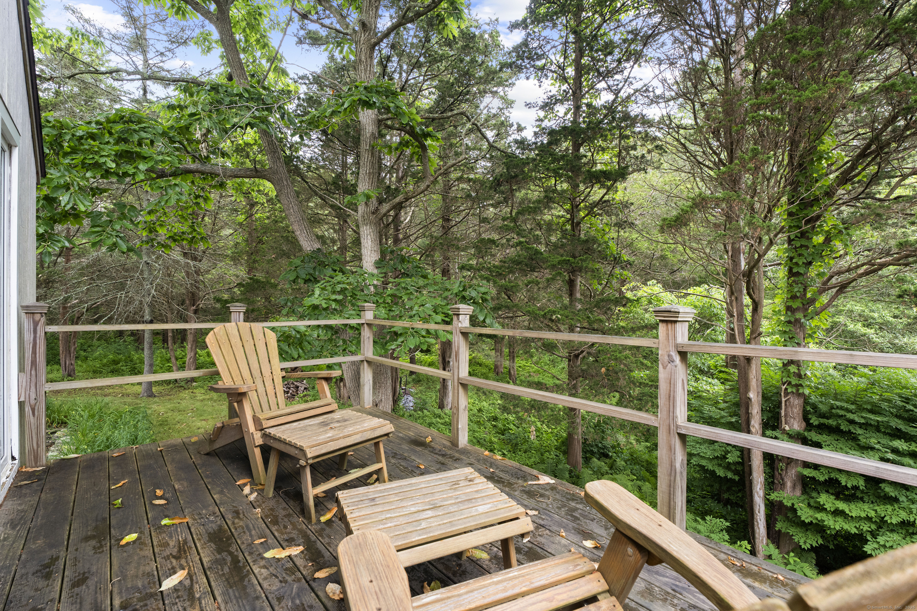 55 A Anna Farm Road West North Stonington, CT 06359 - Photo 39 of 41 a view of a two chairs in the deck