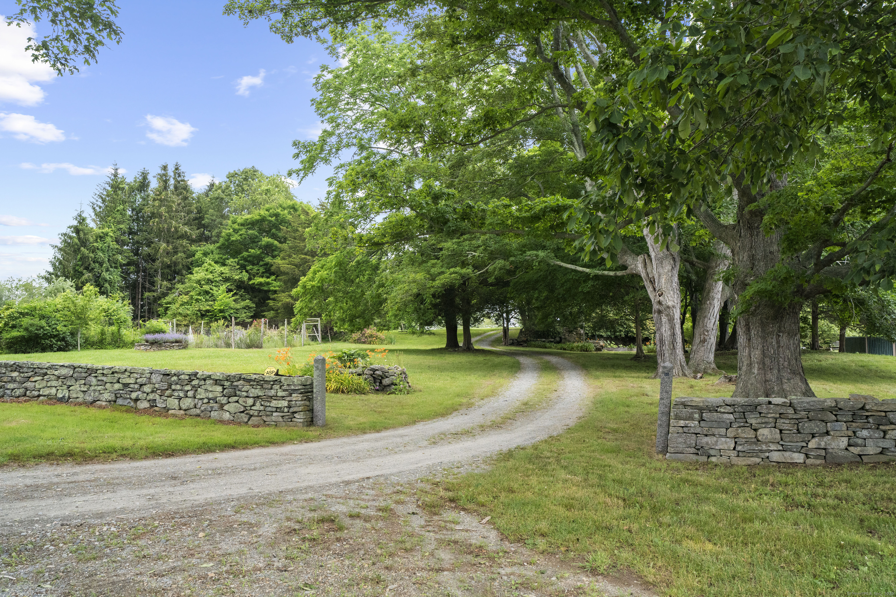 55 A Anna Farm Road West North Stonington, CT 06359 - Photo 5 of 41 a view of a park with large trees