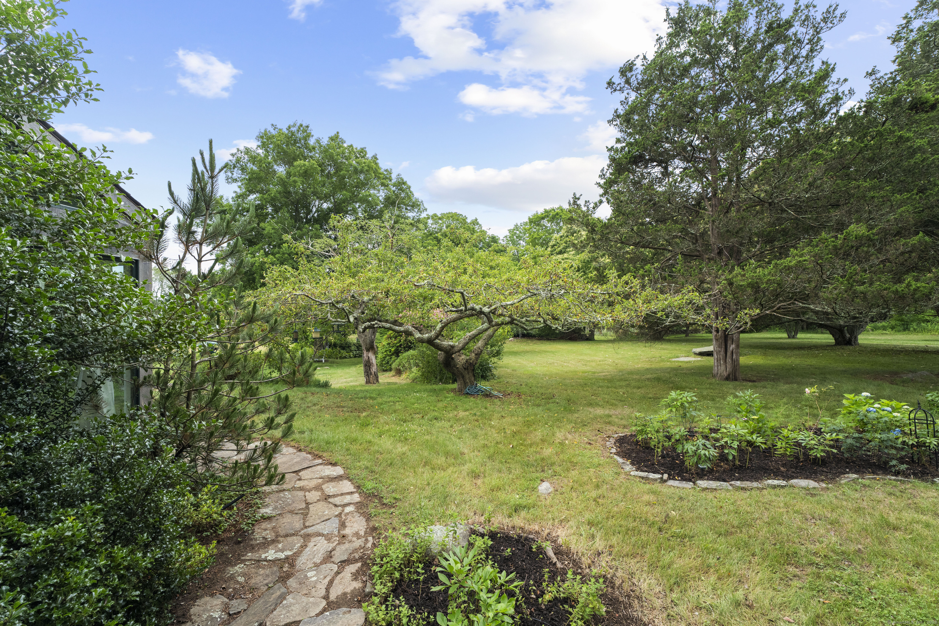 55 A Anna Farm Road West North Stonington, CT 06359 - Photo 8 of 41 a view of a lake with a yard