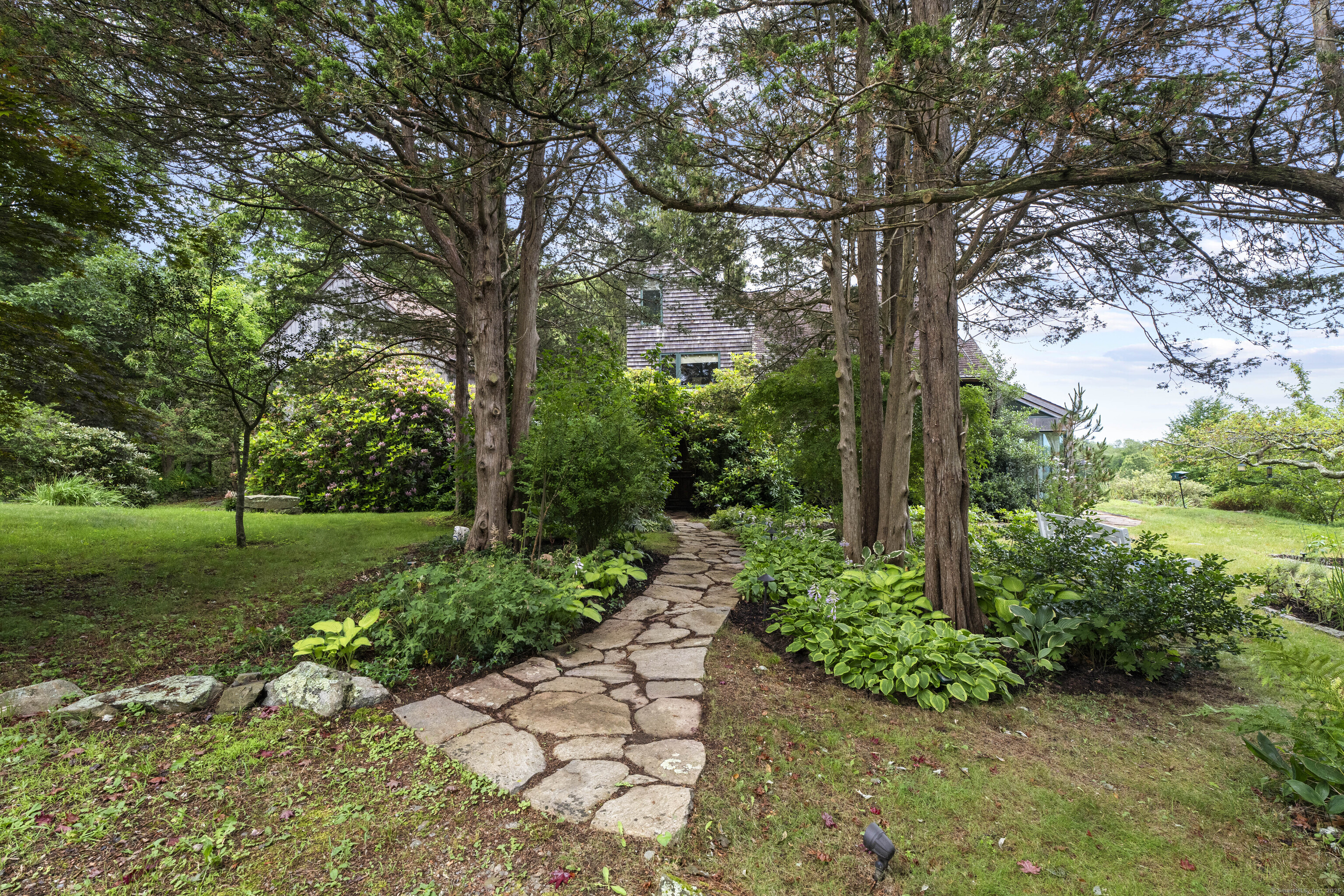 55 A Anna Farm Road West North Stonington, CT 06359 - Photo 9 of 41 a pathway of a yard