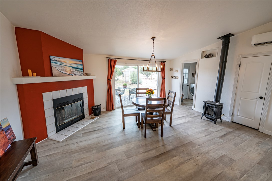 2765 North Silver Springs Road Kingman, AZ 86401 - Photo 38 of 60 a view of a livingroom with furniture and a fireplace