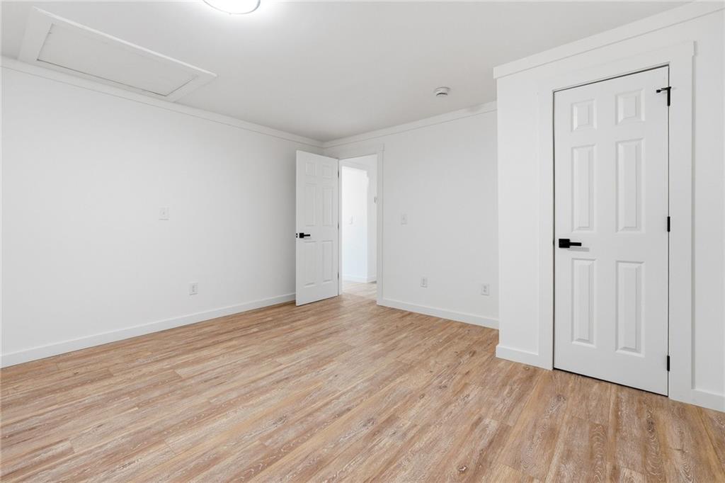 4015 Maple Grove Church Road Resaca, GA 30735 - Photo 19 of 42 a view of an empty room with wooden floor