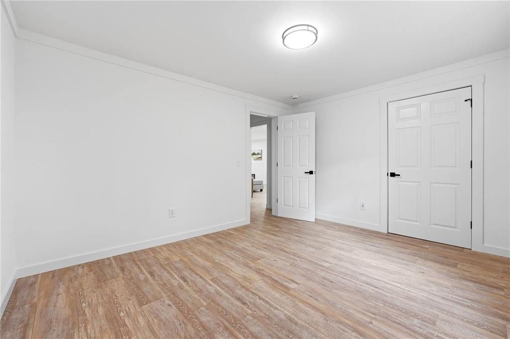 4015 Maple Grove Church Road Resaca, GA 30735 - Photo 21 of 42 a view of an empty room with wooden floor