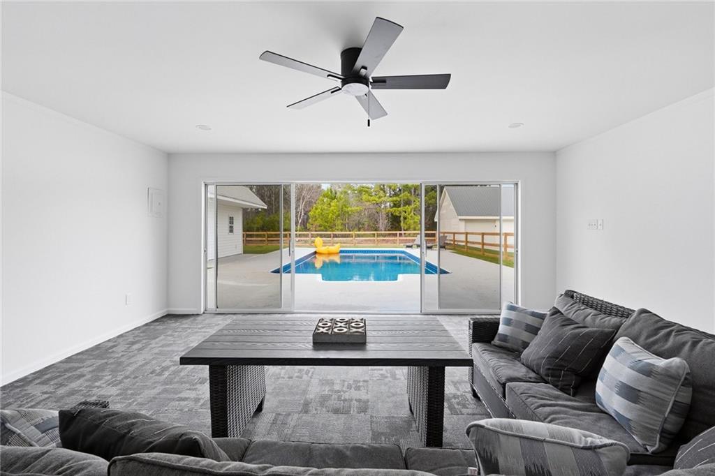 4015 Maple Grove Church Road Resaca, GA 30735 - Photo 24 of 42 a living room with furniture and a window