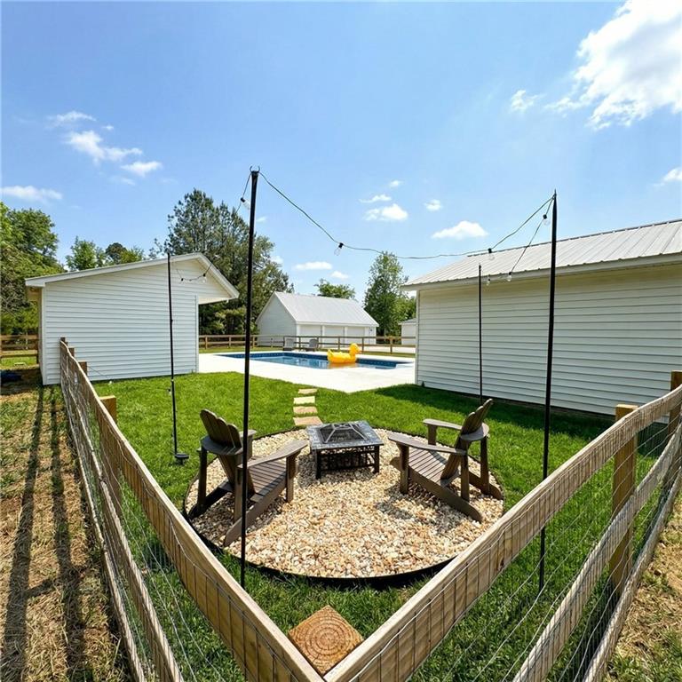 4015 Maple Grove Church Road Resaca, GA 30735 - Photo 25 of 42 a view of swimming pool from a balcony