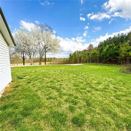 a house view with a garden space