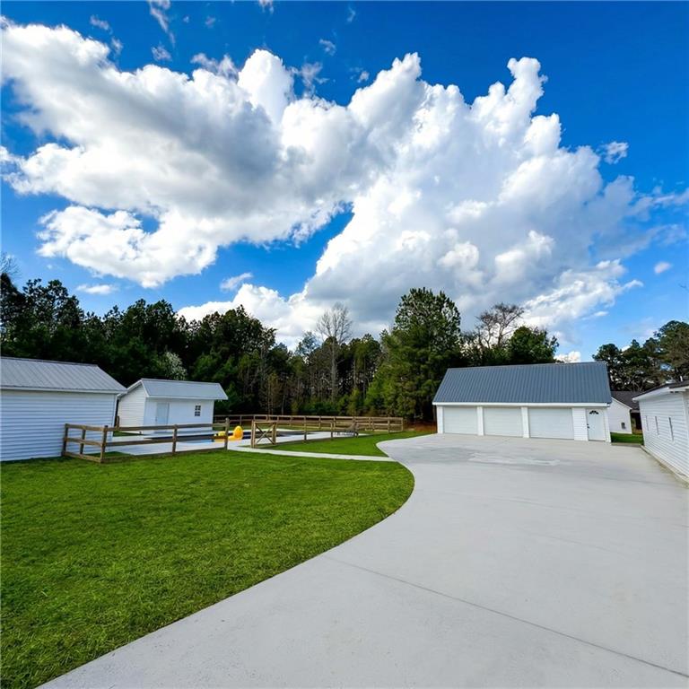 4015 Maple Grove Church Road Resaca, GA 30735 - Photo 37 of 42 a house view with a garden space