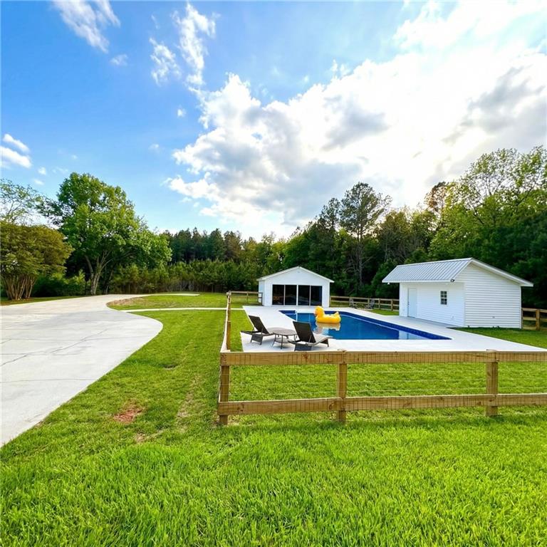 4015 Maple Grove Church Road Resaca, GA 30735 - Photo 38 of 42 a view of a house with a yard