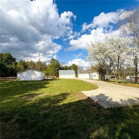 a picture of a room with a white wall and a picture