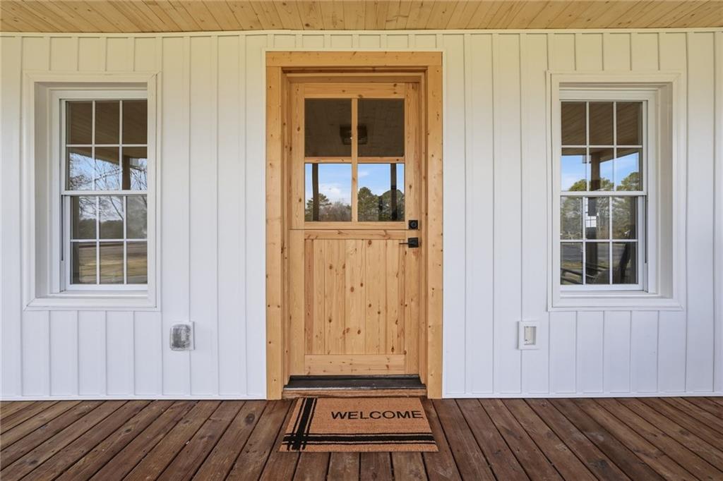 4015 Maple Grove Church Road Resaca, GA 30735 - Photo 5 of 42 a view of a door house with wooden floor