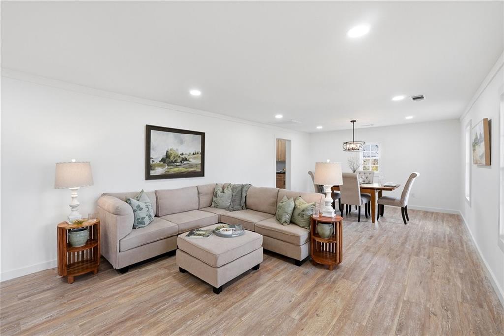 4015 Maple Grove Church Road Resaca, GA 30735 - Photo 9 of 42 a living room with furniture and a wooden floor