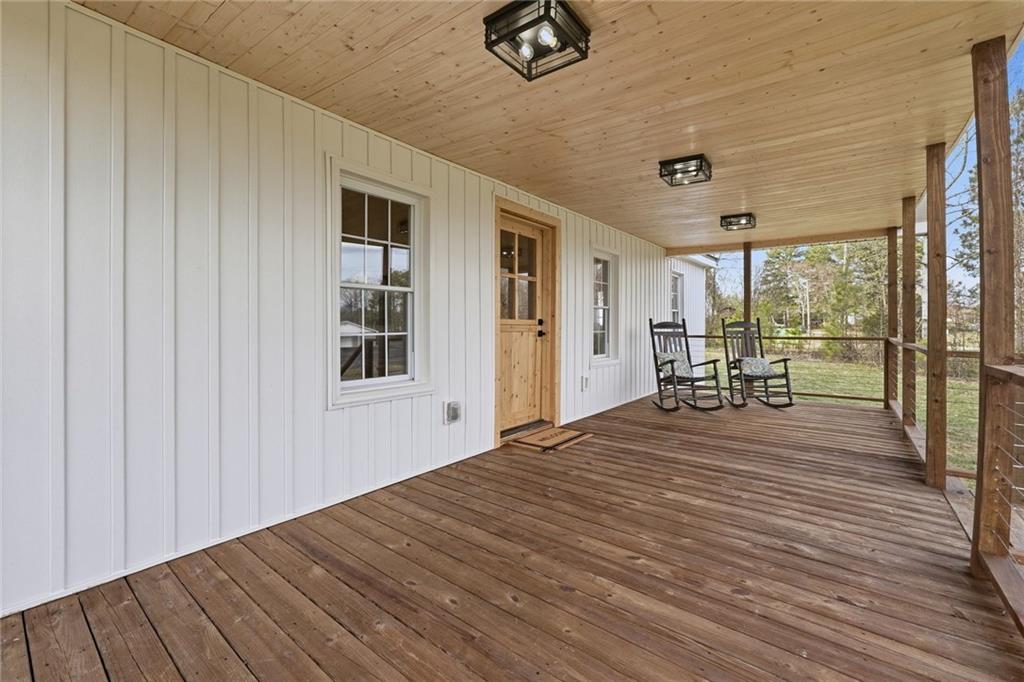 4015 Maple Grove Church Road Resaca, GA 30735 - Photo 10 of 42 a bedroom with a bed and wooden floor