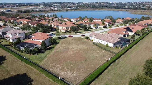 an aerial view of a houses with outdoor space