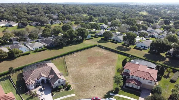 an aerial view of a house with a outdoor space
