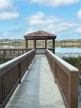 a view of a balcony with wooden floor