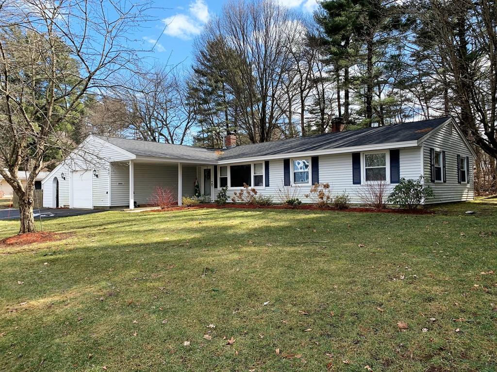 20 Algonquin Road Chelmsford, MA 01824 - Photo 1 of 23 a front view of a house with swimming pool