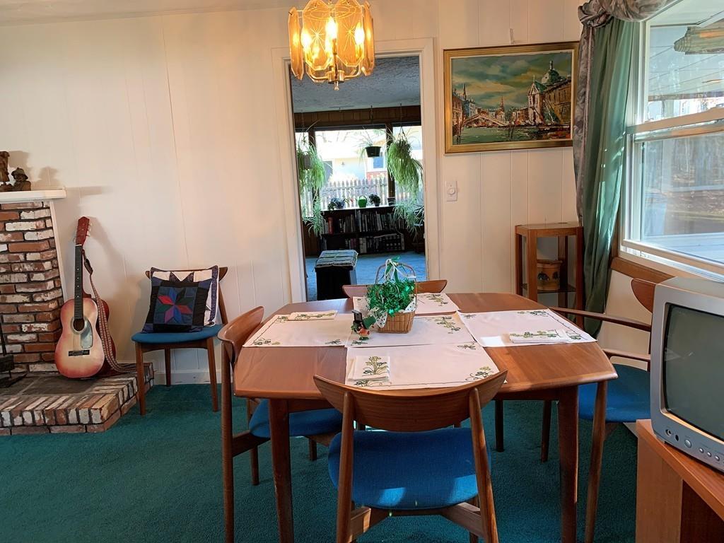 20 Algonquin Road Chelmsford, MA 01824 - Photo 7 of 23 a view of a dining room with furniture window and wooden floor
