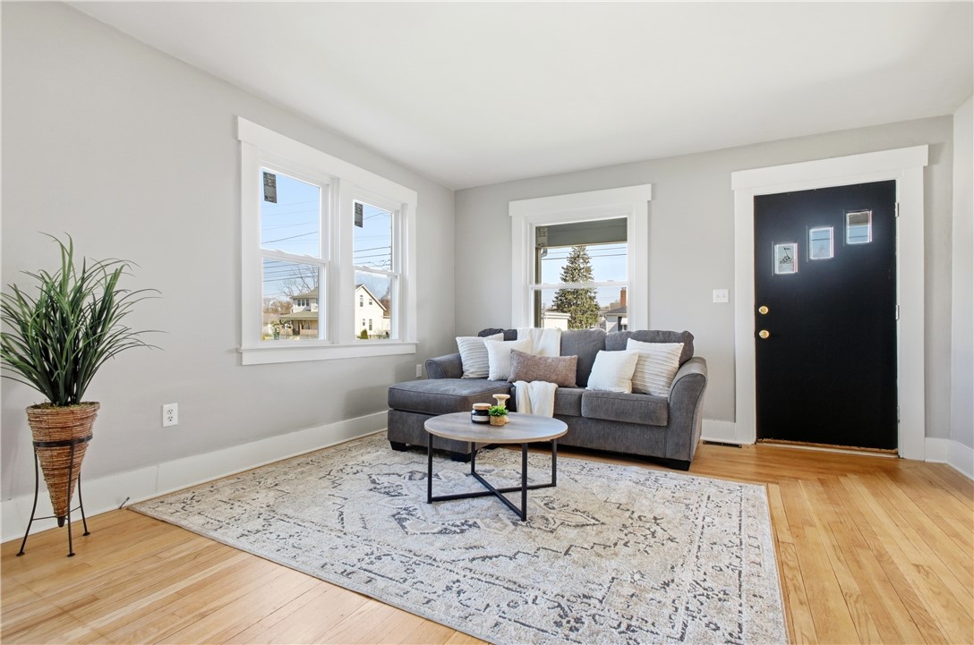 1925 Sunset Avenue Springfield, OH 45505 - Photo 10 of 45 This inviting space features gleaming hardwood floors and ample natural light, creating a bright atmosphere.