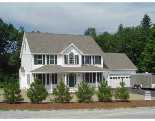 31 Prospect Street Pepperell, MA 01463 - Photo 1 of 1 a aerial view of a house next to a yard