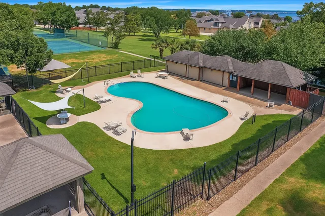 an aerial view of a pool patio patio and outdoor seating