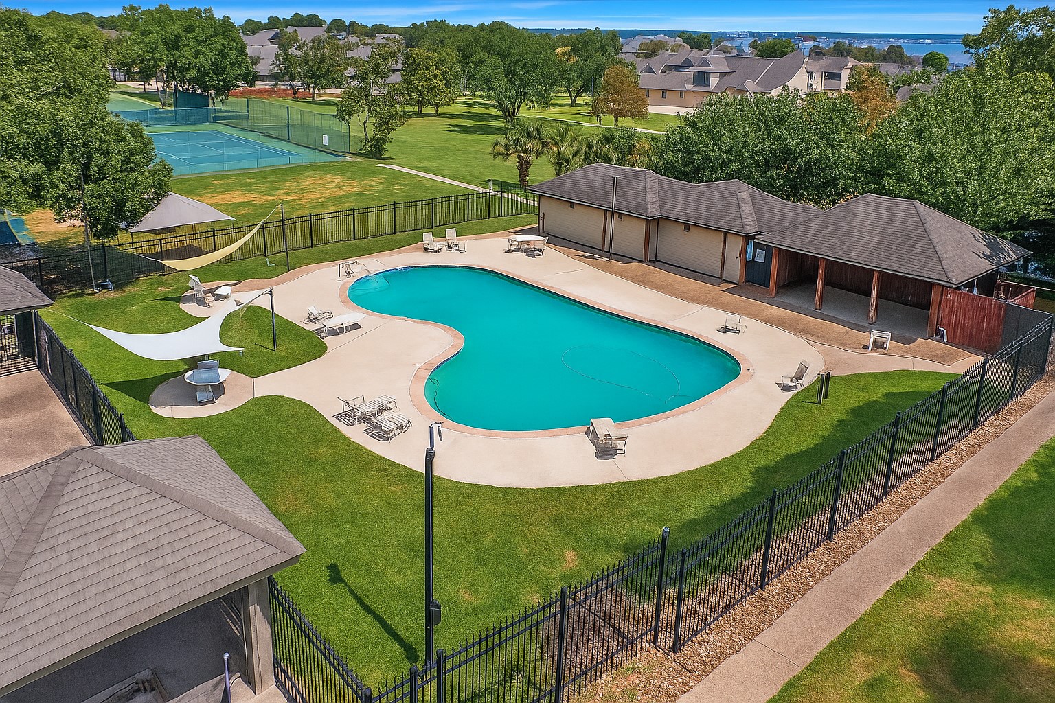 1901 Clipper Court Willis, TX 77318 - Photo 22 of 23 an aerial view of a pool patio patio and outdoor seating
