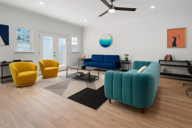 a living room with furniture and a rug