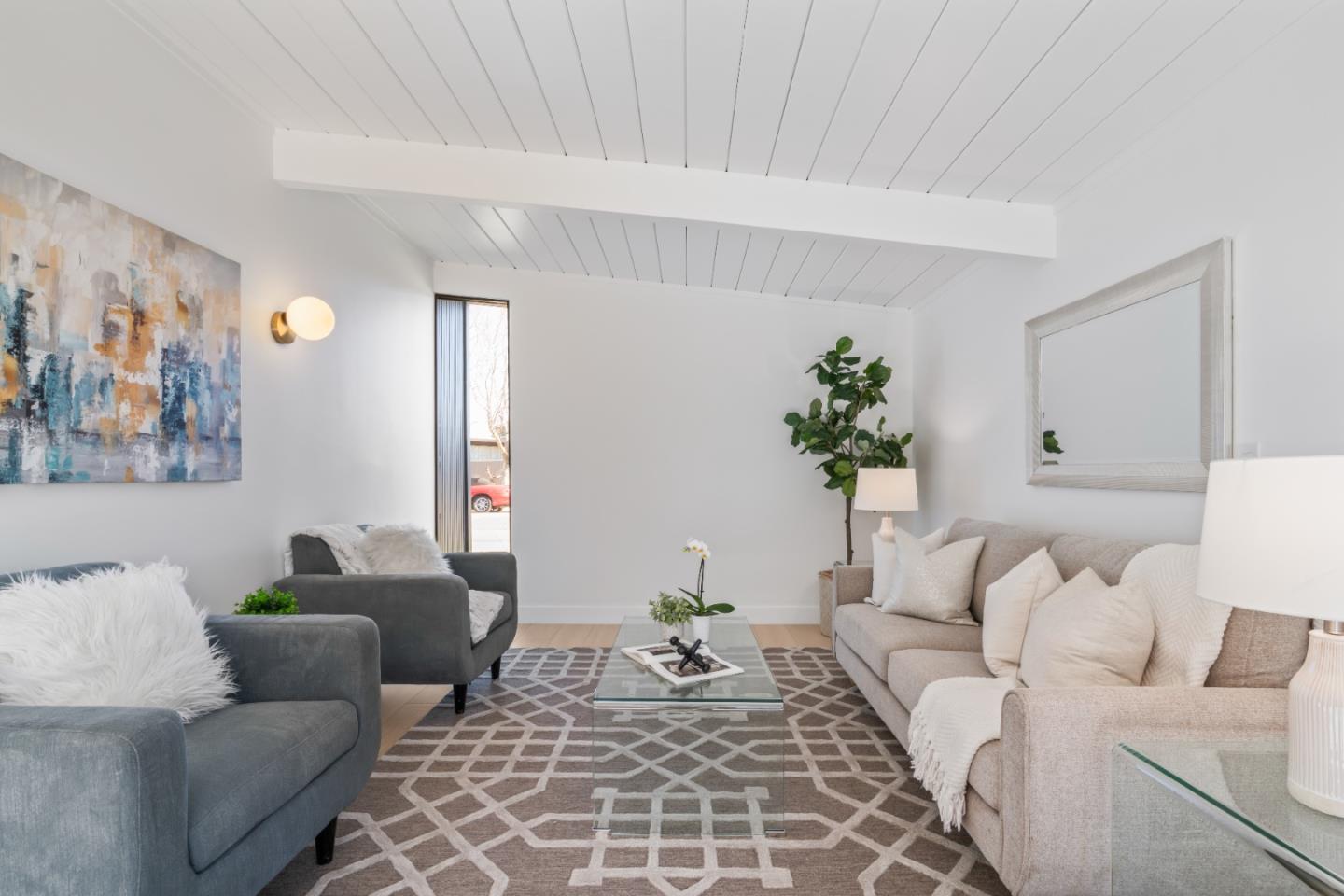 1714 Celeste Drive San Mateo, CA 94402 - Photo 16 of 45 a living room with furniture and a potted plant