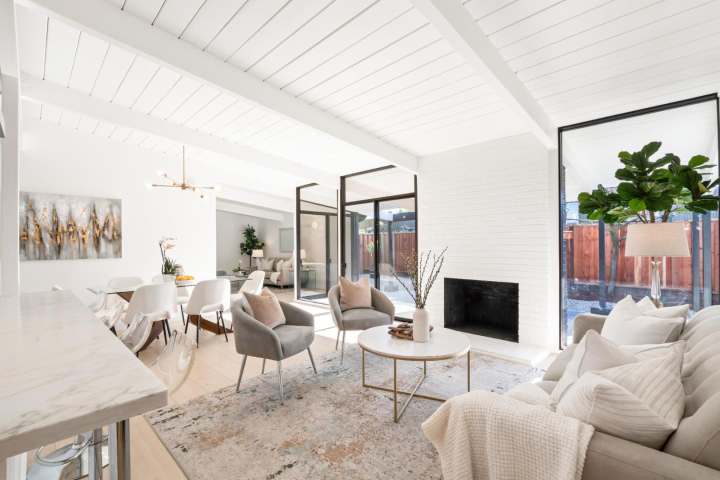 1714 Celeste Drive San Mateo, CA 94402 - Photo 17 of 45 a living room with furniture and a flat screen tv