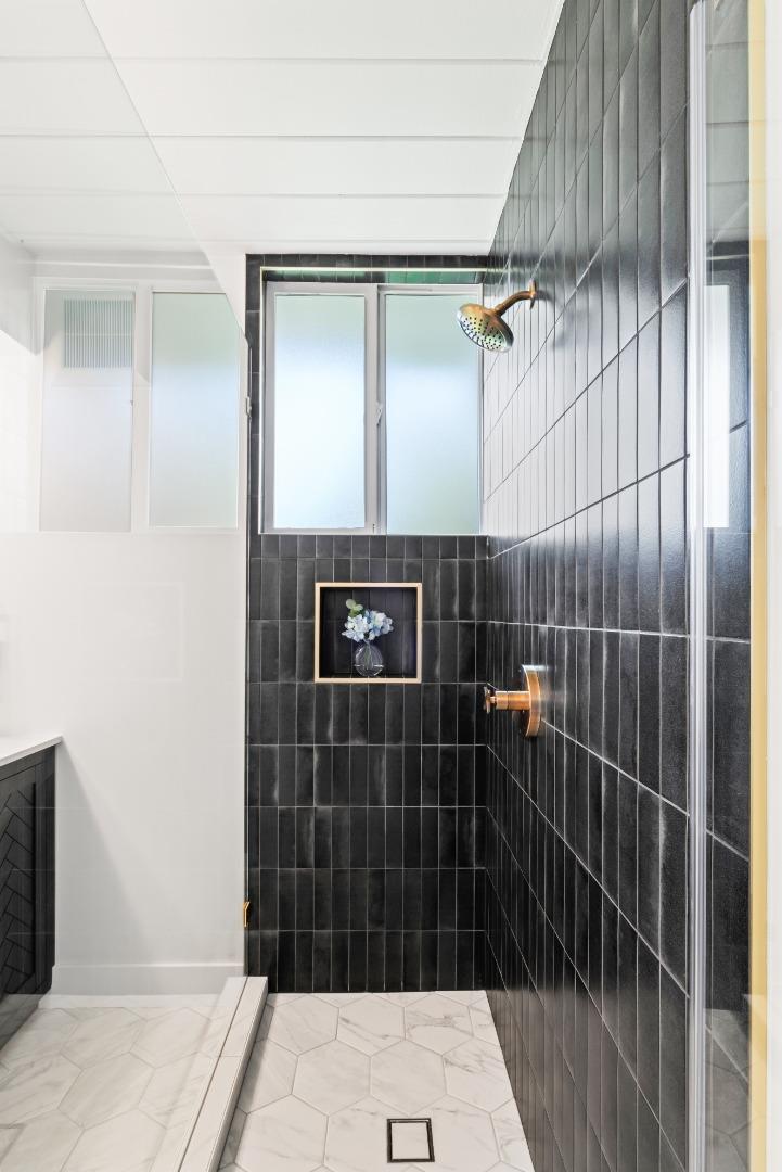 1714 Celeste Drive San Mateo, CA 94402 - Photo 25 of 45 a bathroom with a shower