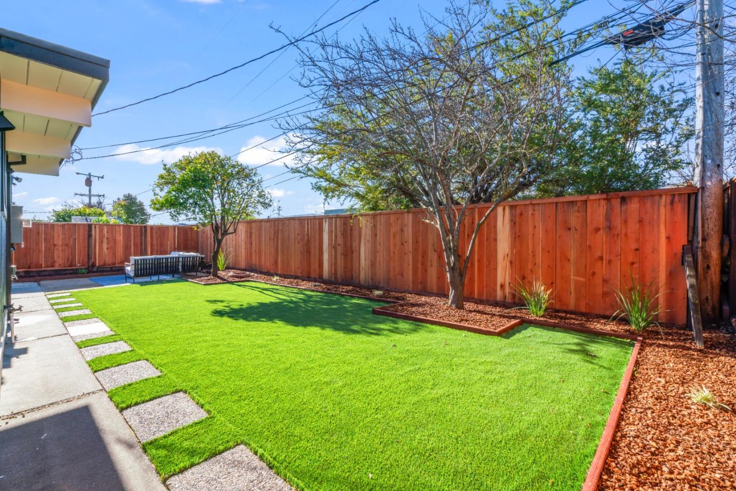1714 Celeste Drive San Mateo, CA 94402 - Photo 34 of 45 a view of yard with furniture and garden