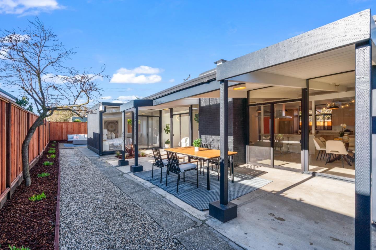 1714 Celeste Drive San Mateo, CA 94402 - Photo 41 of 45 a view of a porch with chairs and backyard