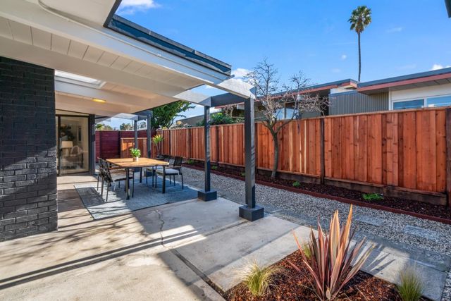 a view of a room with wooden walls